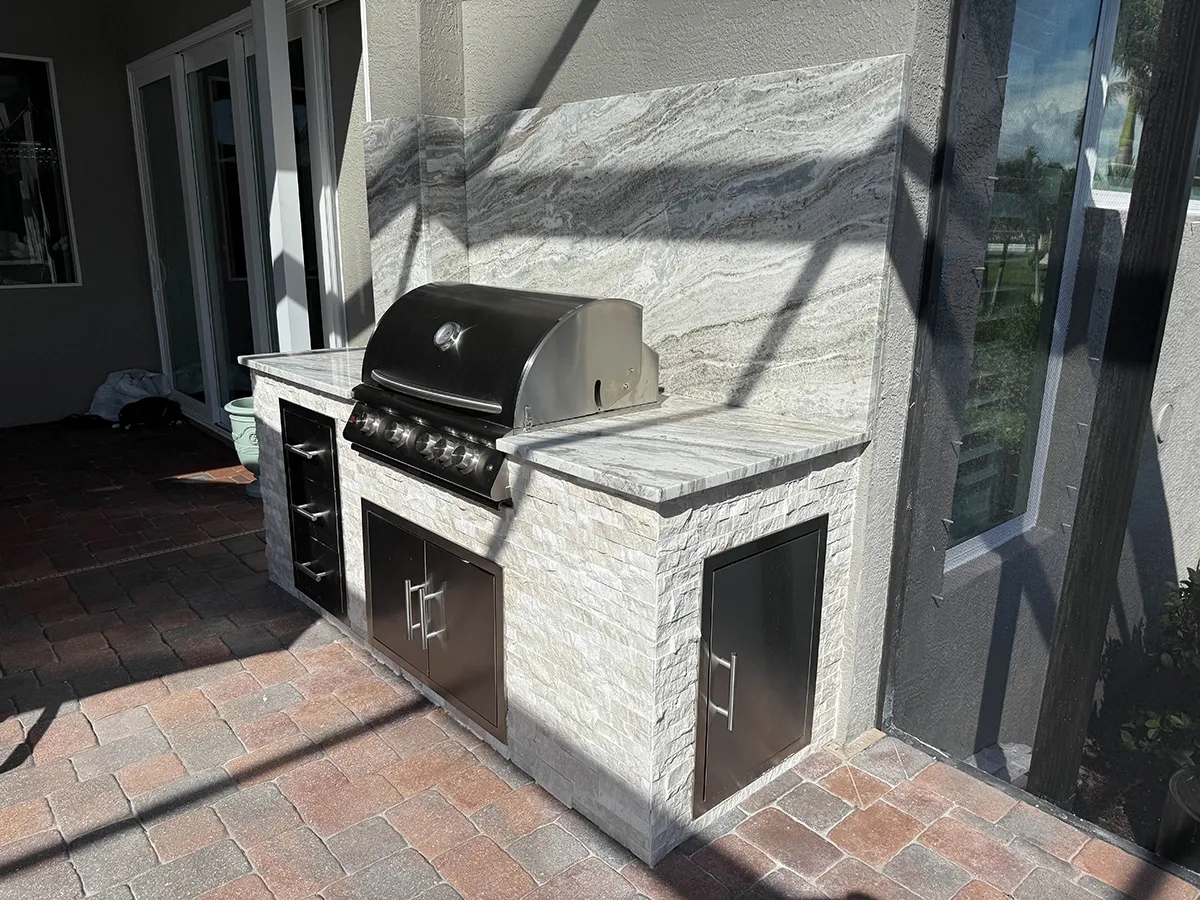 Built-in outdoor grill by Oasis Outdoor Living