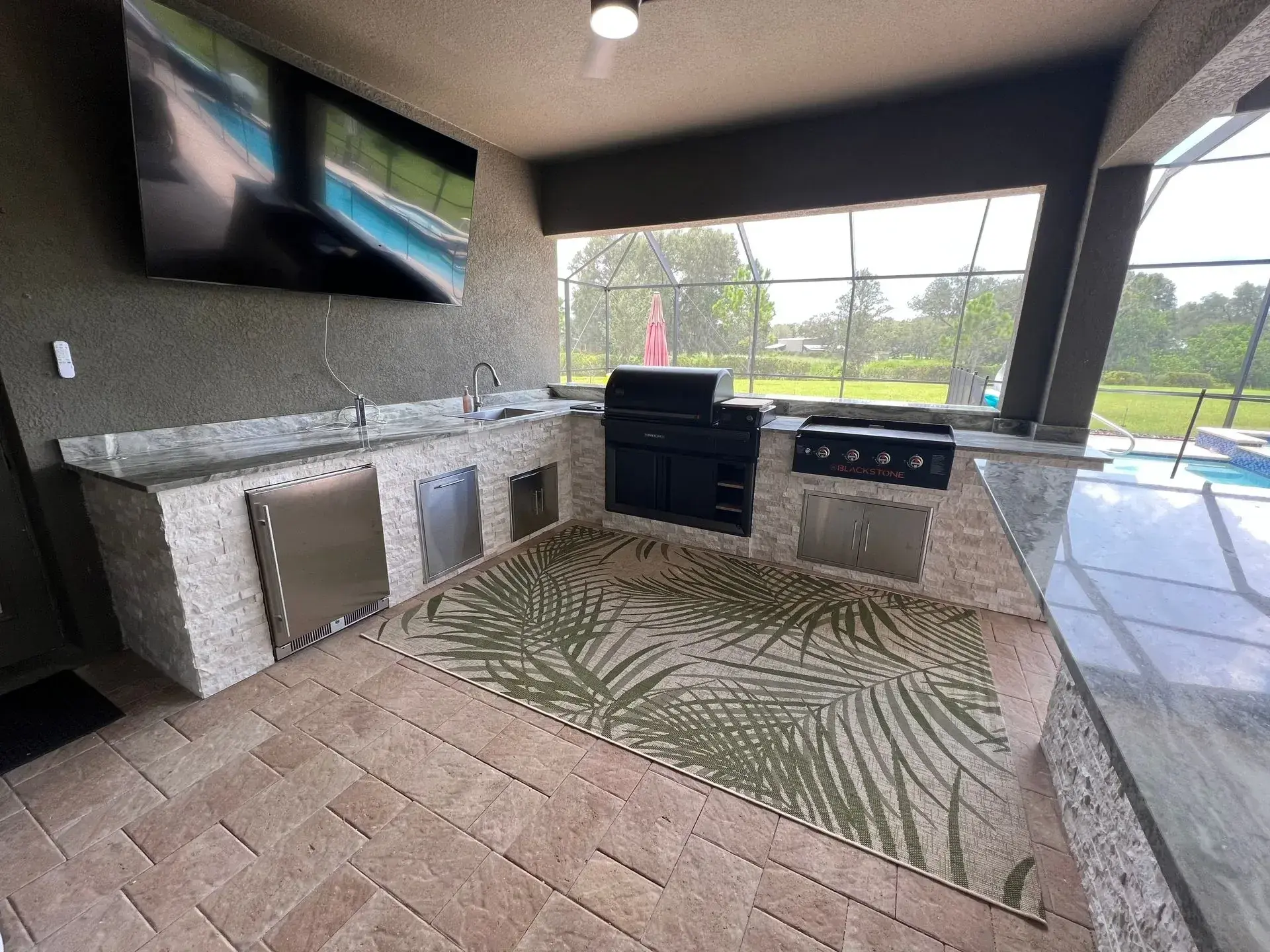 Contemporary Outdoor Kitchen Outdoor Kitchen Remodel by Oasis Grilling Affordable Outdoor Kitchens — Project 3 project photo
