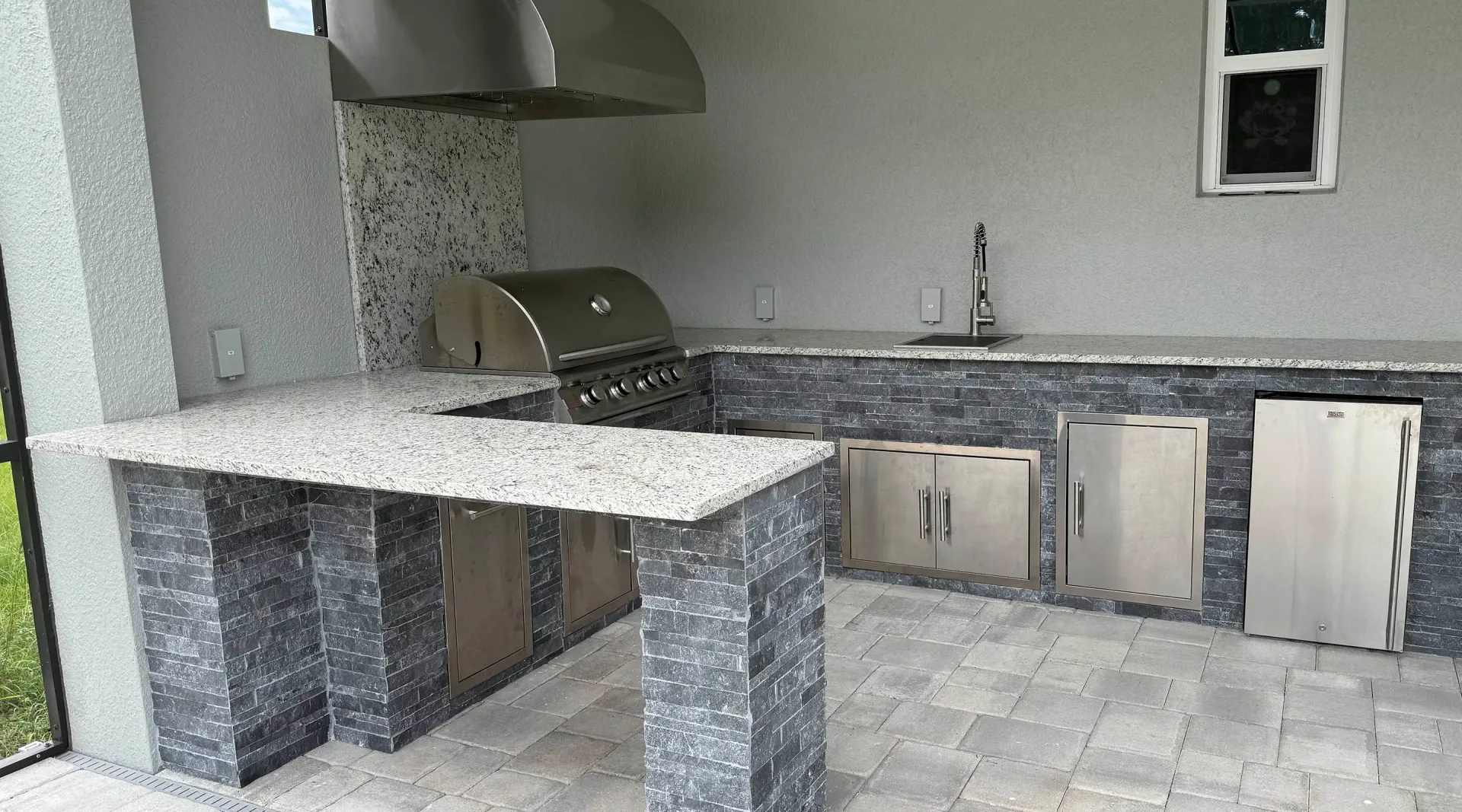 Outdoor kitchen storage and cabinetry by Oasis Outdoor Living